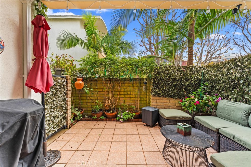 13243 Fiji Way, Unit K Marina del Rey, CA 90292 - Photo 33 of 39 a view of backyard with outdoor seating and plants