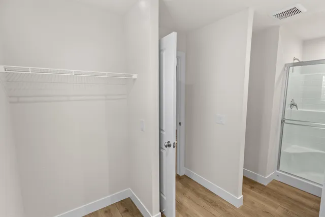 a view of small space with wooden floor