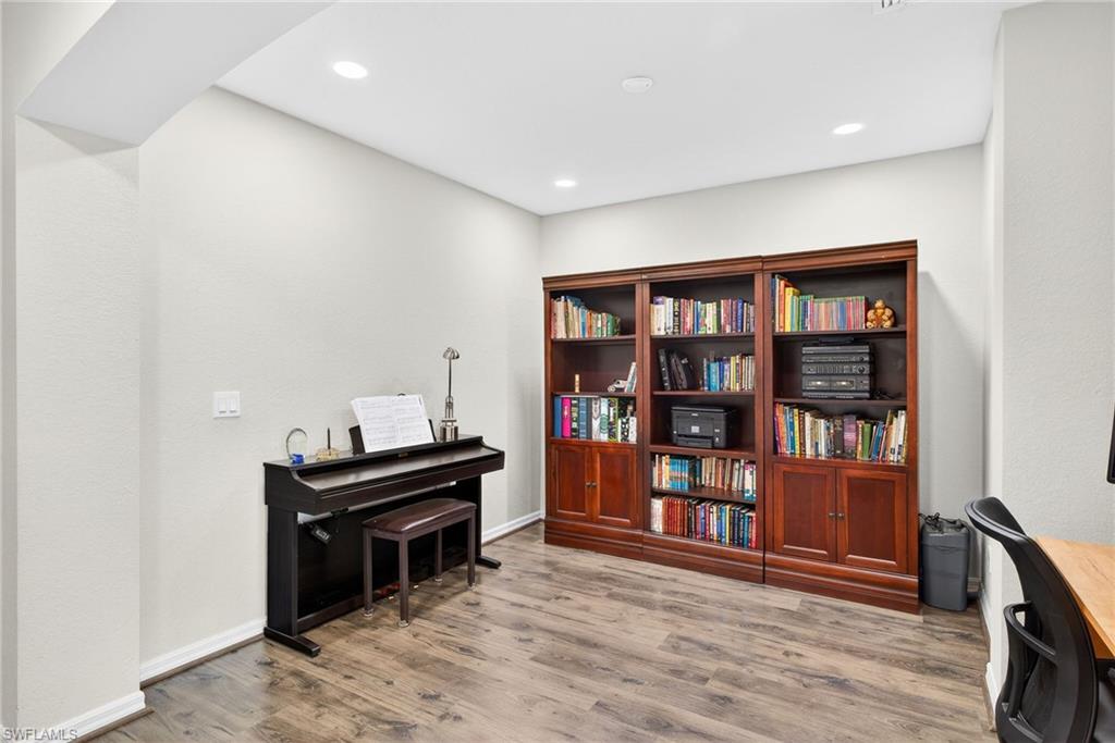 9530 Roundstone Circle Fort Myers, FL 33967 - Photo 19 of 35 a view of a workspace with furniture and cabinet