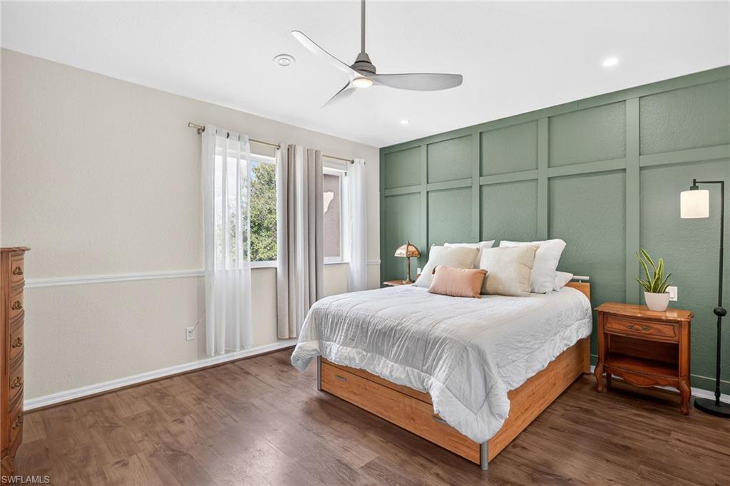 9530 Roundstone Circle Fort Myers, FL 33967 - Photo 10 of 35 a bedroom with a bed and a table