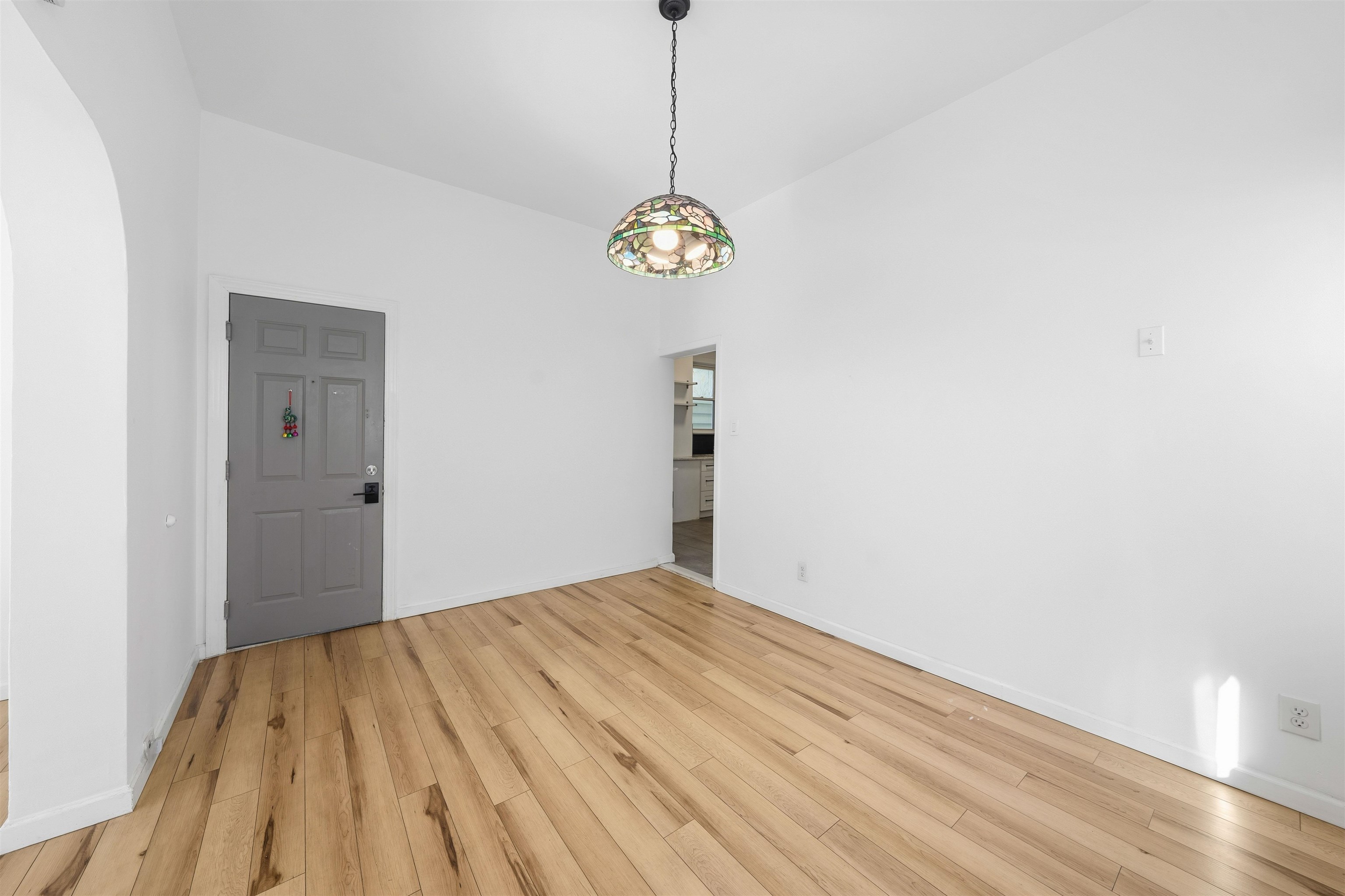 124 73rd Street, Unit 1 North Bergen, NJ 07047 - Photo 11 of 21 a view of a hallway with wooden floor