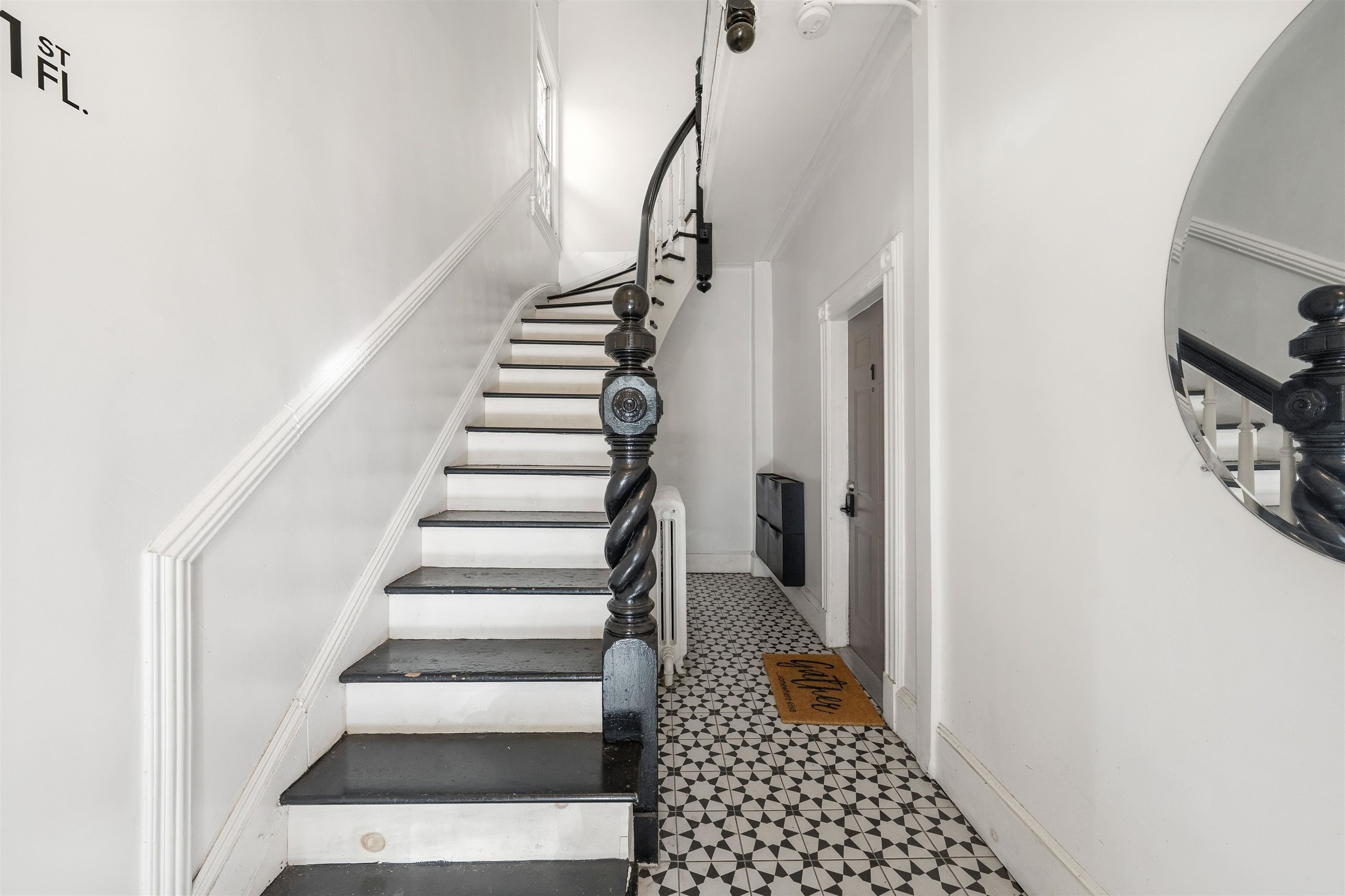 124 73rd Street, Unit 1 North Bergen, NJ 07047 - Photo 15 of 21 a view of entryway with stairs and wooden floor