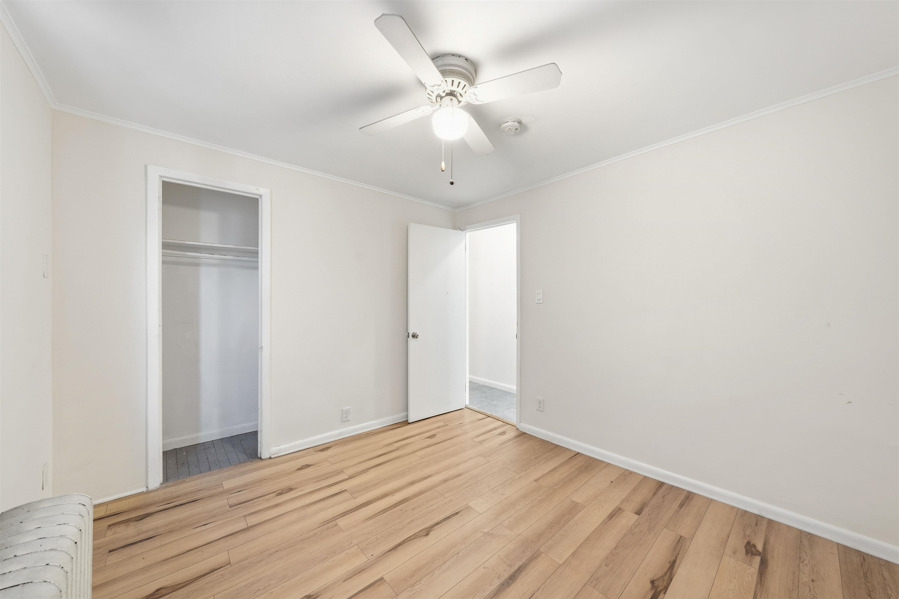 124 73rd Street, Unit 1 North Bergen, NJ 07047 - Photo 5 of 21 a view of empty room with wooden floor
