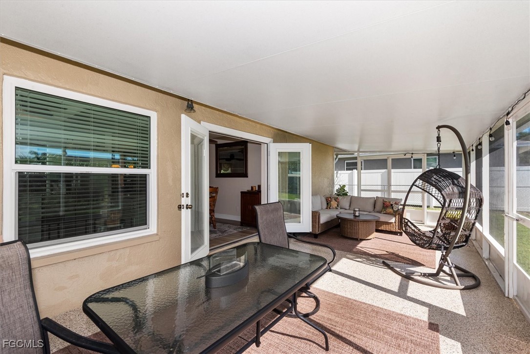 2124 Northeast 3rd Terrace Cape Coral, FL 33909 - Photo 28 of 32 a living room with furniture