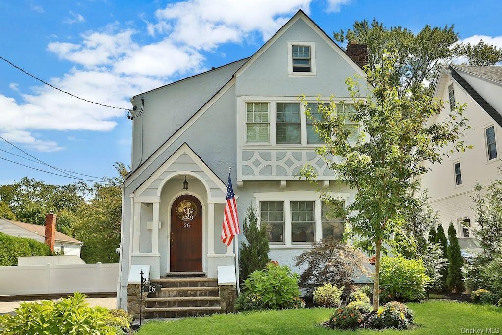 36 Central Drive Bronxville, NY 10708 - Photo 1 of 29 a front view of a house with a yard