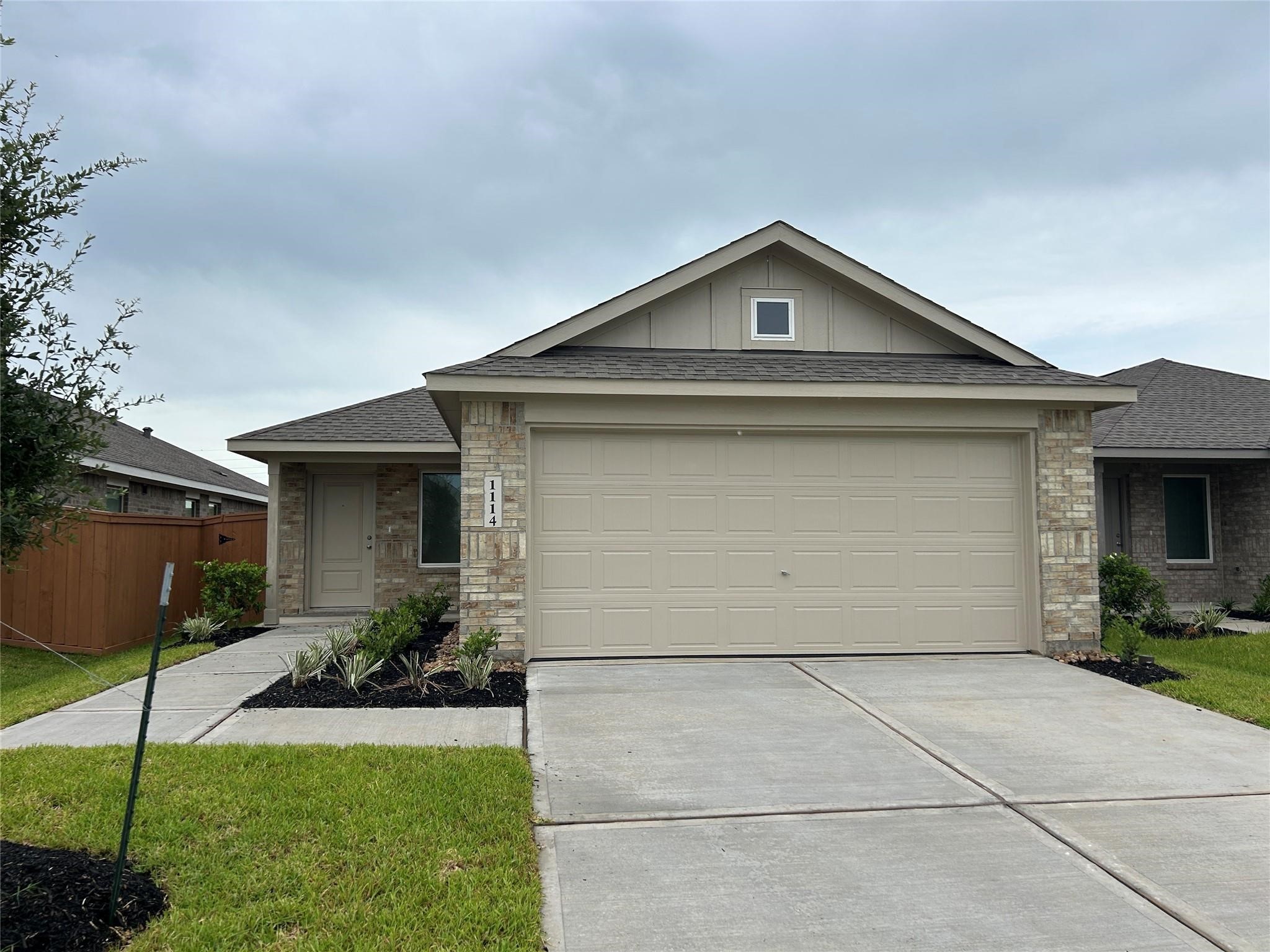 a front view of house with garage