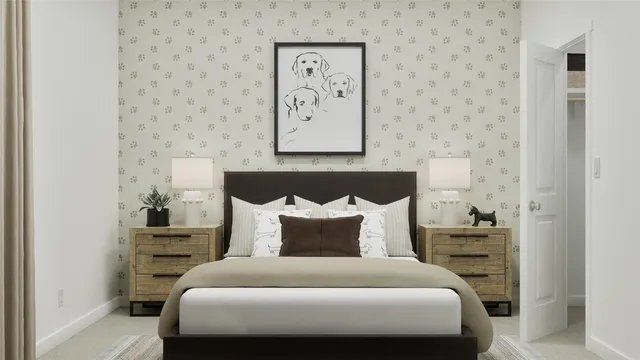 a bedroom with a bed and a painting on the wall