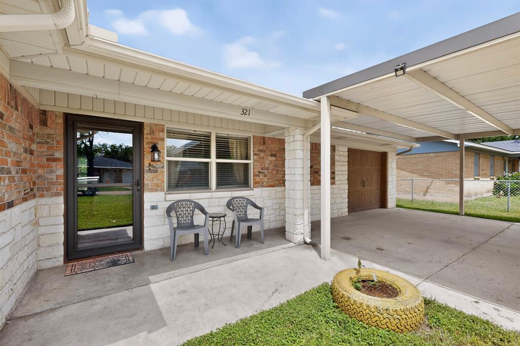 321 Redbud Street Rhome, TX 76078 - Photo 2 of 17 Welcoming front entry.
