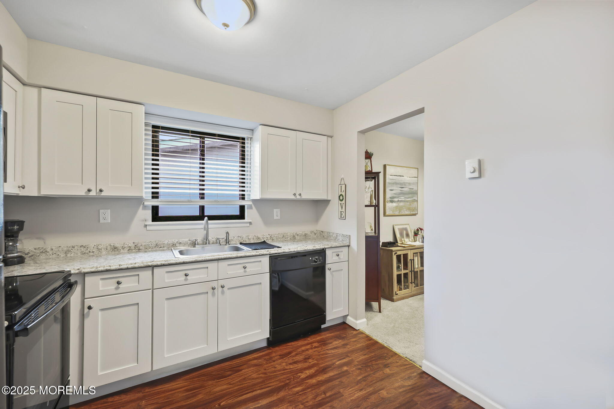 49 Markham Road Brick, NJ 08724 - Photo 12 of 21 a kitchen with a sink stove and cabinets