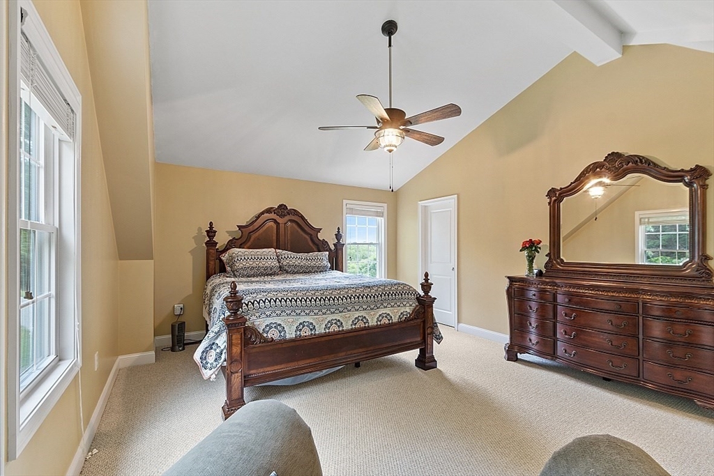 204 Littleton County Road Harvard, MA 01451 - Photo 20 of 42 a bedroom with a bed dresser and a window