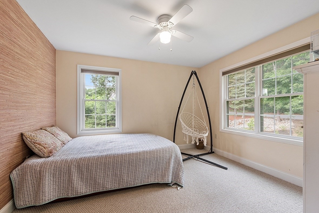 204 Littleton County Road Harvard, MA 01451 - Photo 27 of 42 a bedroom with a bed and a large window