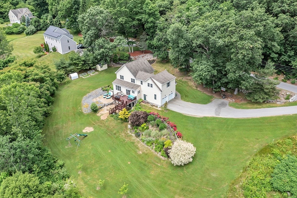 204 Littleton County Road Harvard, MA 01451 - Photo 34 of 42 an aerial view of a house with a yard and lake view