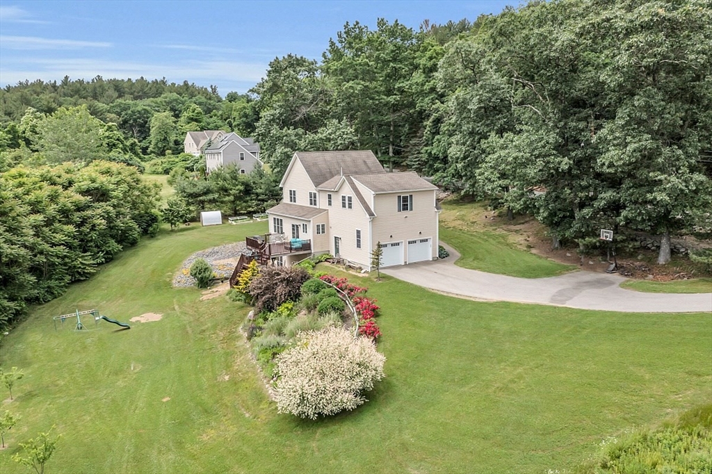 204 Littleton County Road Harvard, MA 01451 - Photo 35 of 42 a view of a house with a yard