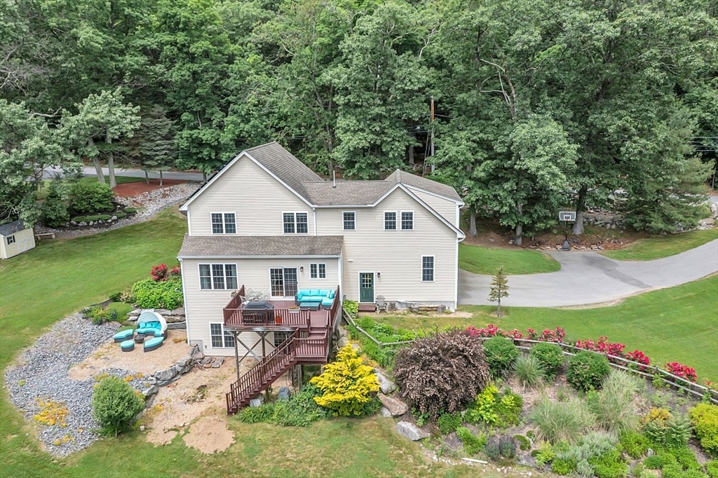 204 Littleton County Road Harvard, MA 01451 - Photo 36 of 42 a front view of a house with garden and porch