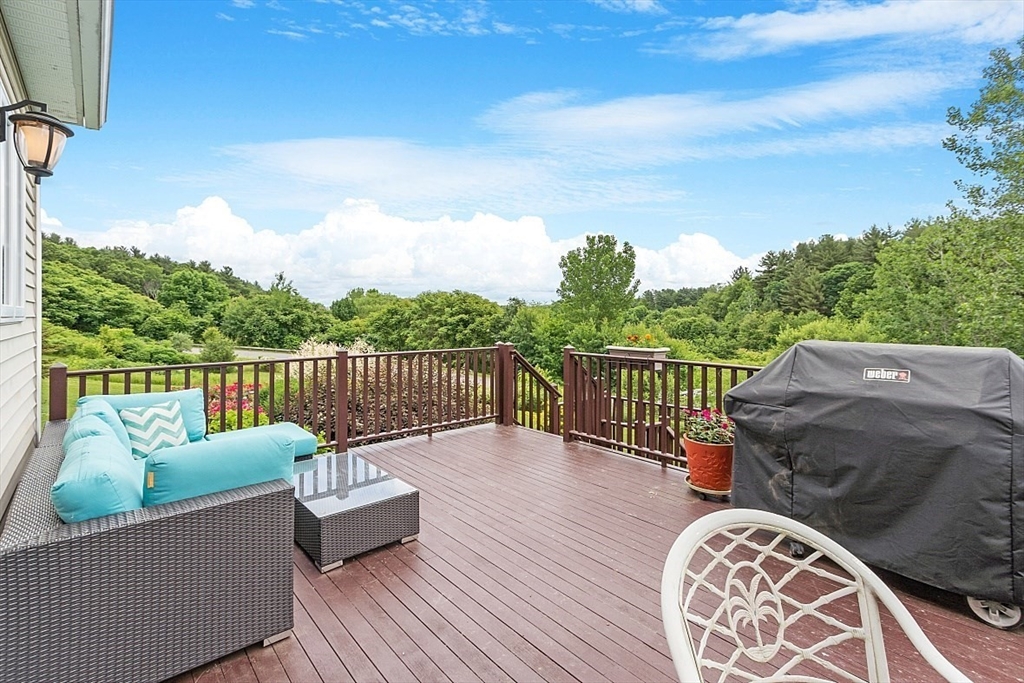 204 Littleton County Road Harvard, MA 01451 - Photo 39 of 42 a balcony with wooden floor