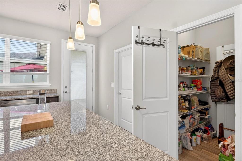 2100 Gopher Tortoise Terrace Oakland, FL 34787 - Photo 17 of 58 a bedroom with furniture and a window