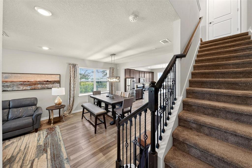 2100 Gopher Tortoise Terrace Oakland, FL 34787 - Photo 19 of 58 a view of a livingroom with furniture and wooden floor
