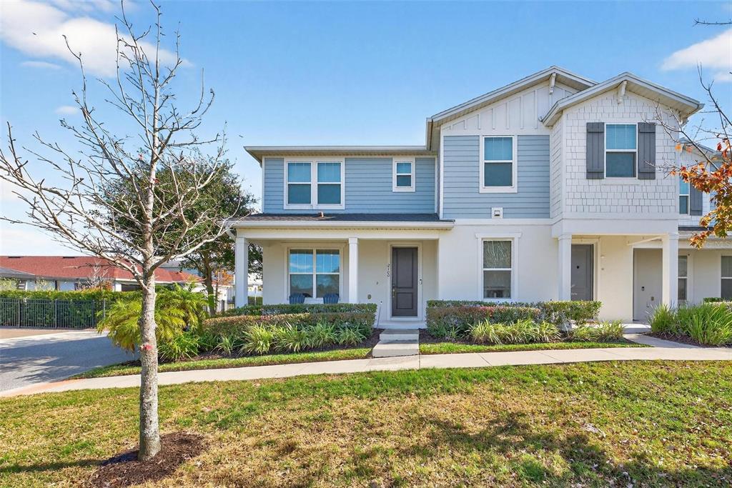 2100 Gopher Tortoise Terrace Oakland, FL 34787 - Photo 2 of 58 a front view of a house with garden