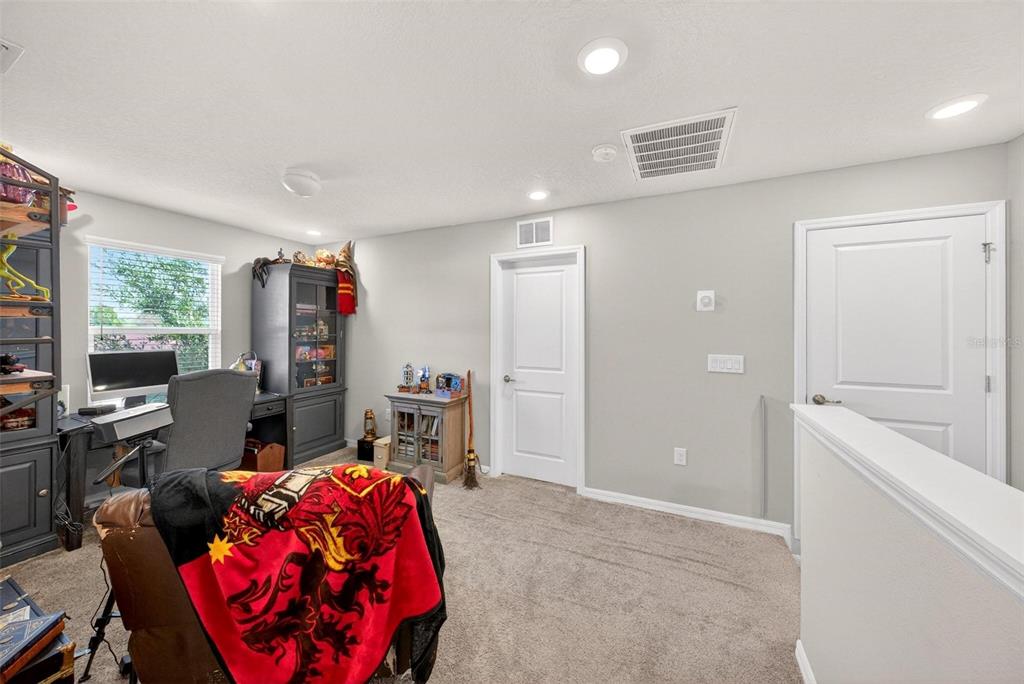 2100 Gopher Tortoise Terrace Oakland, FL 34787 - Photo 27 of 58 a workspace with furniture and window