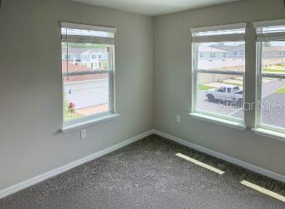 2100 Gopher Tortoise Terrace Oakland, FL 34787 - Photo 38 of 58 a view of an empty room with a window