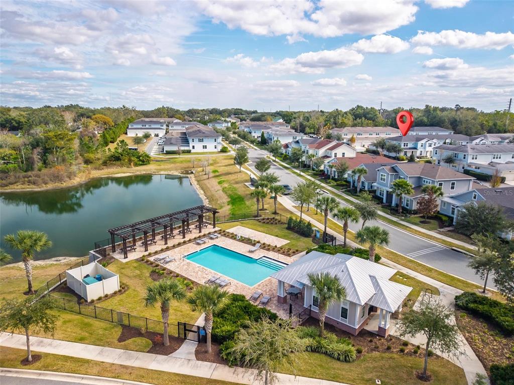 2100 Gopher Tortoise Terrace Oakland, FL 34787 - Photo 56 of 58 an aerial view of residential building and lake