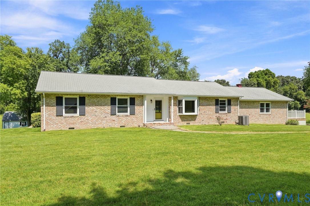 2981 Smokey Road Aylett, VA 23009 - Photo 1 of 84 Brick clad exterior, light tone roof, with white t