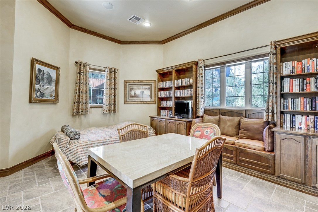 264 Crestview Drive Mount Charleston, NV 89124 - Photo 21 of 78 This versatile space features durable tile flooring, built-in shelving, and ample natural light.