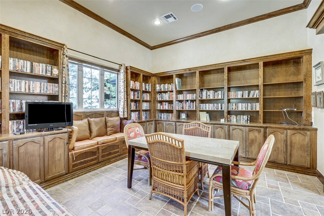 264 Crestview Drive Mount Charleston, NV 89124 - Photo 22 of 78 This versatile study features extensive built-in shelving, providing a perfect space for reading or quiet contemplation.