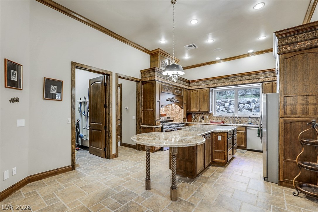 264 Crestview Drive Mount Charleston, NV 89124 - Photo 25 of 78 This spacious kitchen offers ample counter space and storage, perfect for culinary endeavors.