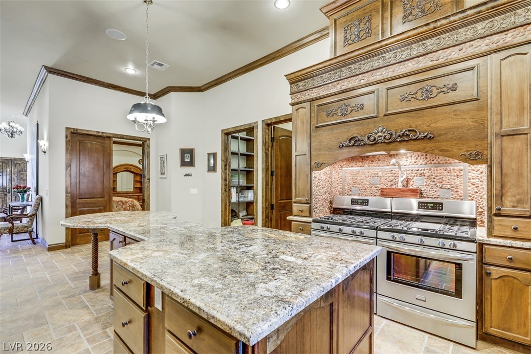 264 Crestview Drive Mount Charleston, NV 89124 - Photo 27 of 78 This spacious kitchen features custom cabinetry, premium appliances, and a grand island for culinary exploration.