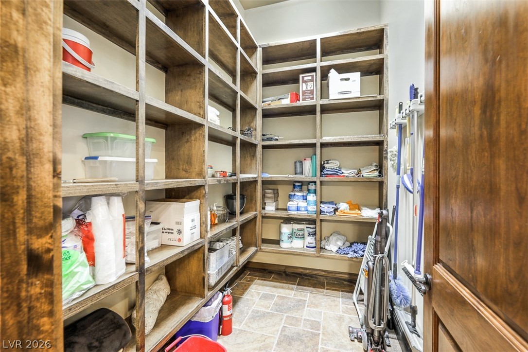264 Crestview Drive Mount Charleston, NV 89124 - Photo 33 of 78 Functional pantry provides ample storage with extensive shelving and durable tile flooring.
