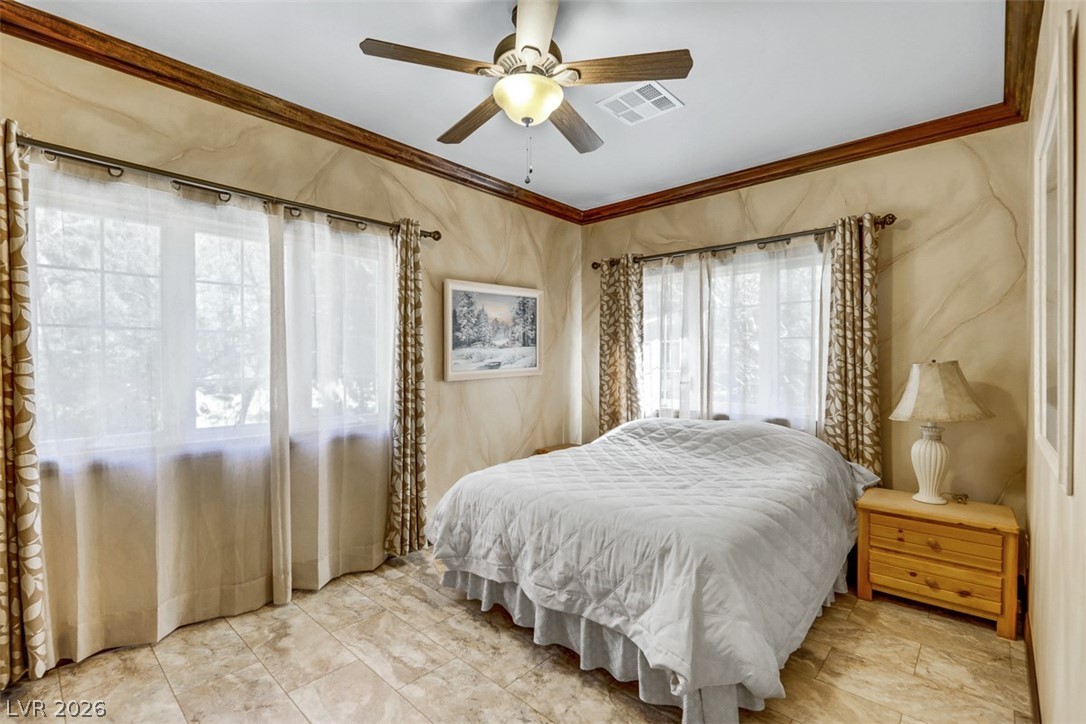 264 Crestview Drive Mount Charleston, NV 89124 - Photo 46 of 78 This tranquil bedroom features abundant natural light, providing a serene and comfortable living space.