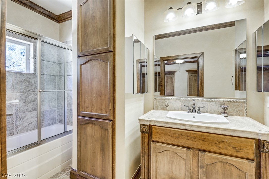 264 Crestview Drive Mount Charleston, NV 89124 - Photo 51 of 78 This bathroom features a sophisticated vanity with ample storage, providing both style and utility.