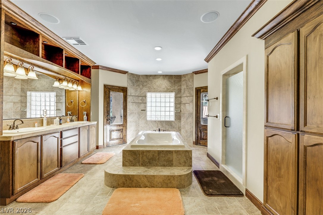 264 Crestview Drive Mount Charleston, NV 89124 - Photo 57 of 78 This spacious bathroom offers a relaxing retreat with a deep soaking tub and dual vanities.