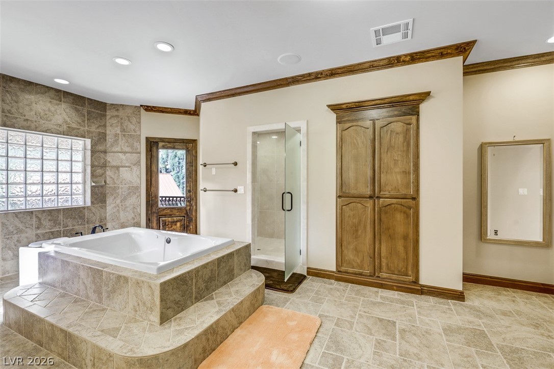 264 Crestview Drive Mount Charleston, NV 89124 - Photo 58 of 78 This spacious bathroom offers a relaxing soaking tub and elegant tile work.