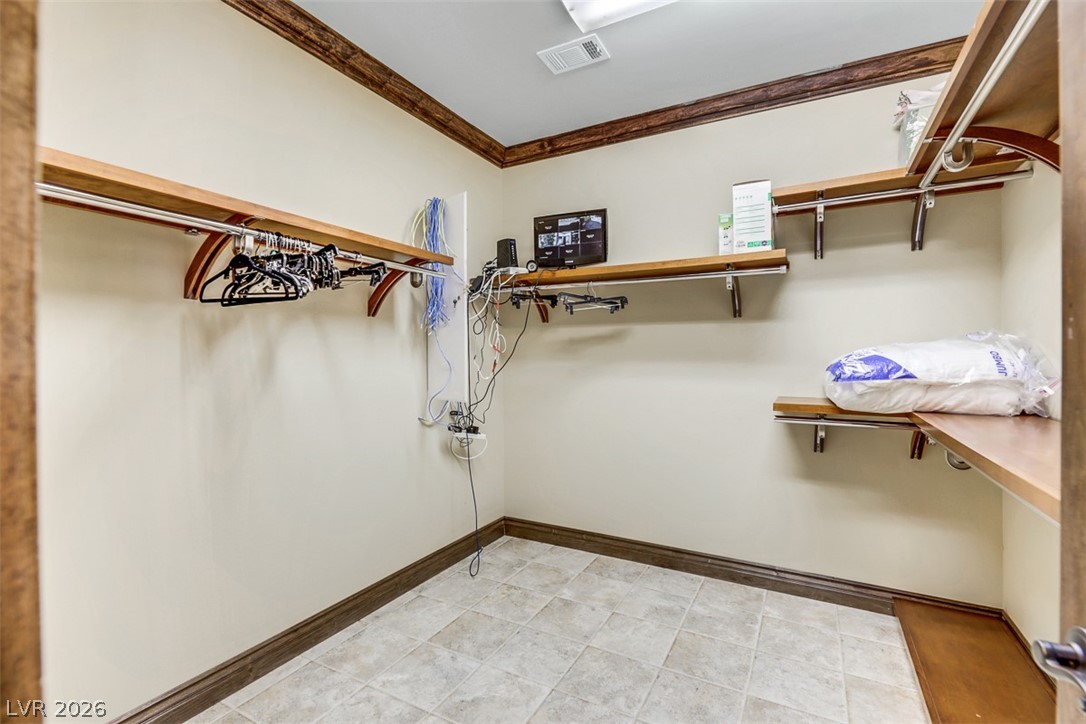 264 Crestview Drive Mount Charleston, NV 89124 - Photo 60 of 78 This spacious closet offers organized storage solutions with ample shelving and hanging space.