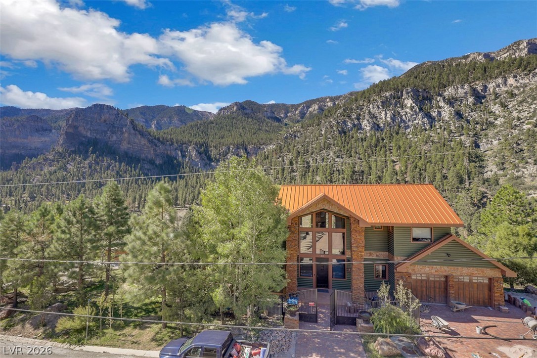 264 Crestview Drive Mount Charleston, NV 89124 - Photo 65 of 78 This magnificent mountain home is nestled against a backdrop of majestic peaks and lush forests.