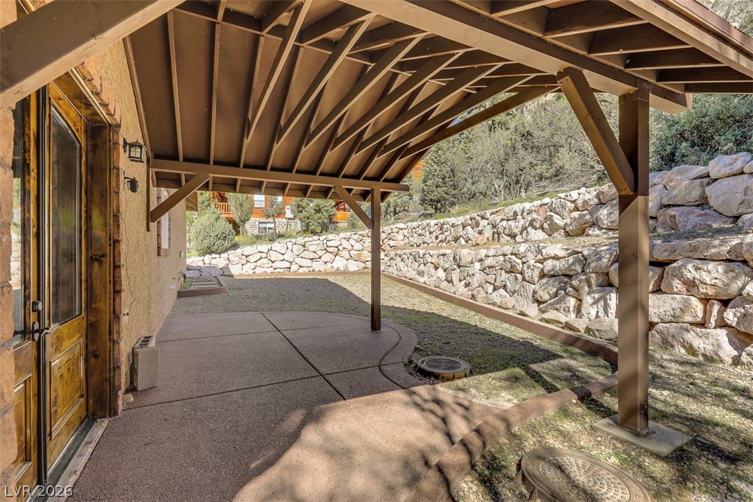 264 Crestview Drive Mount Charleston, NV 89124 - Photo 67 of 78 This private patio offers a tranquil retreat with a covered area perfect for outdoor enjoyment.