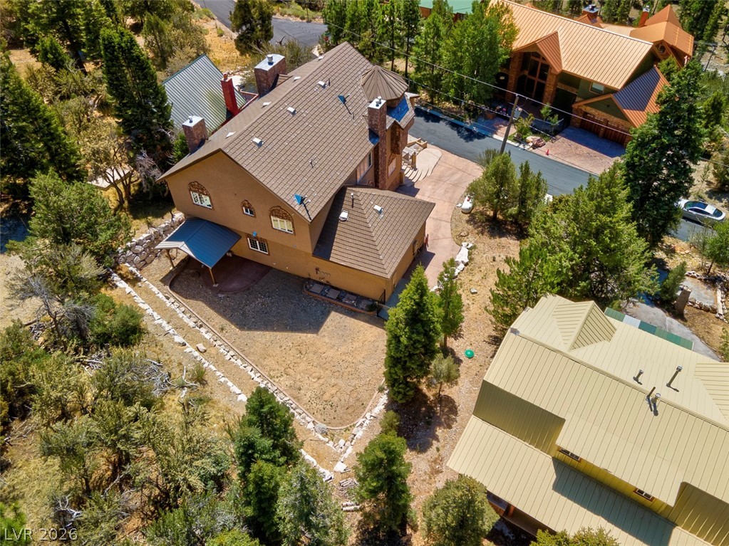 264 Crestview Drive Mount Charleston, NV 89124 - Photo 74 of 78 An aerial perspective reveals a private residence nestled amidst lush, verdant trees.