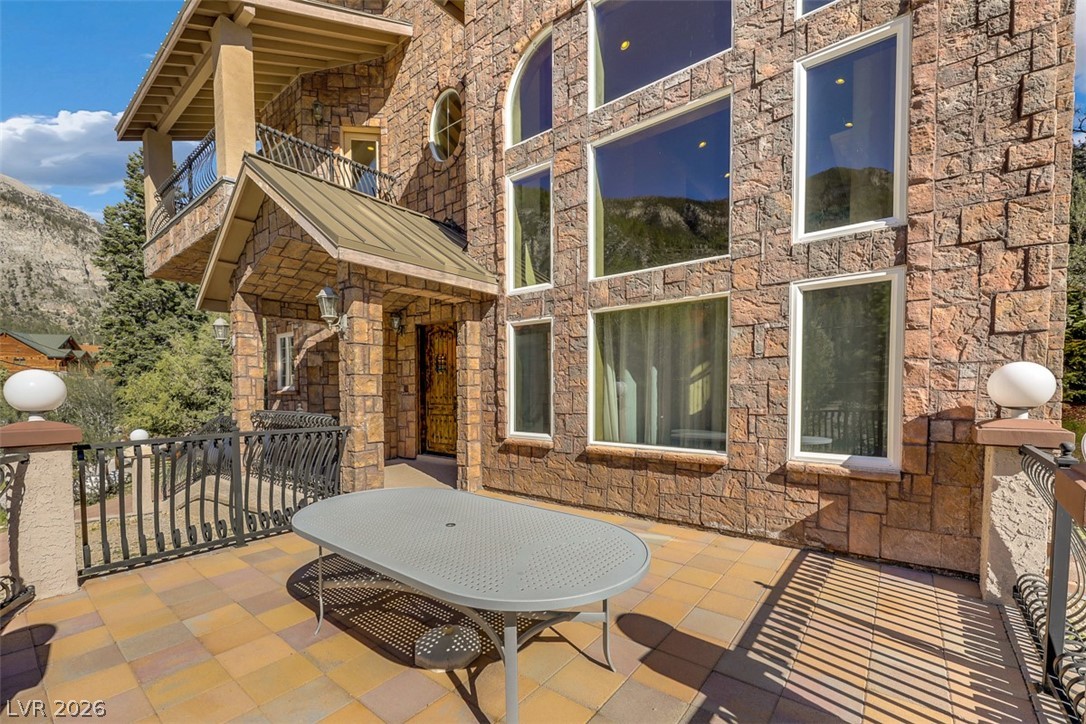 264 Crestview Drive Mount Charleston, NV 89124 - Photo 10 of 78 This magnificent stone facade residence offers expansive views from multiple windows and a charming patio space.