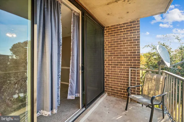 a view of a balcony with chair