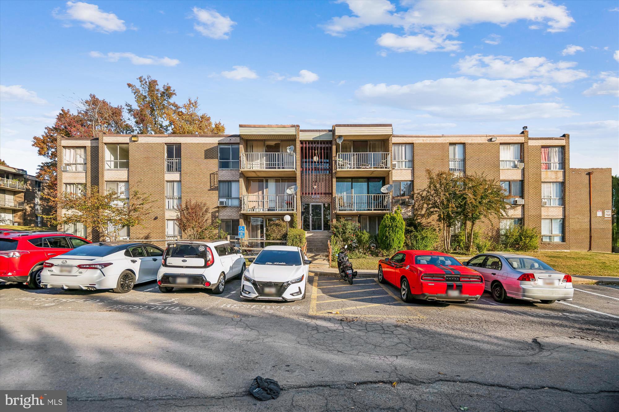 7973 Riggs Road, Unit 8 Hyattsville, MD 20783 - Photo 2 of 45 a car parked in front of a building