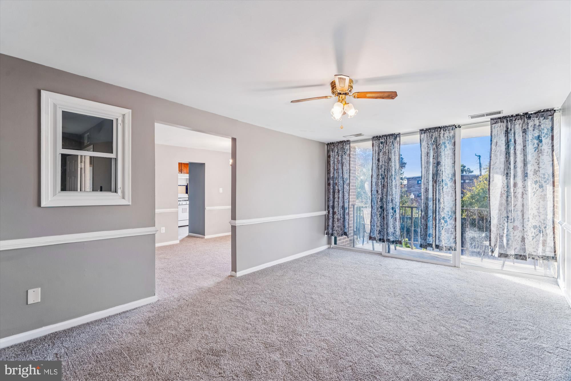 7973 Riggs Road, Unit 8 Hyattsville, MD 20783 - Photo 38 of 45 a view of an empty room with a window
