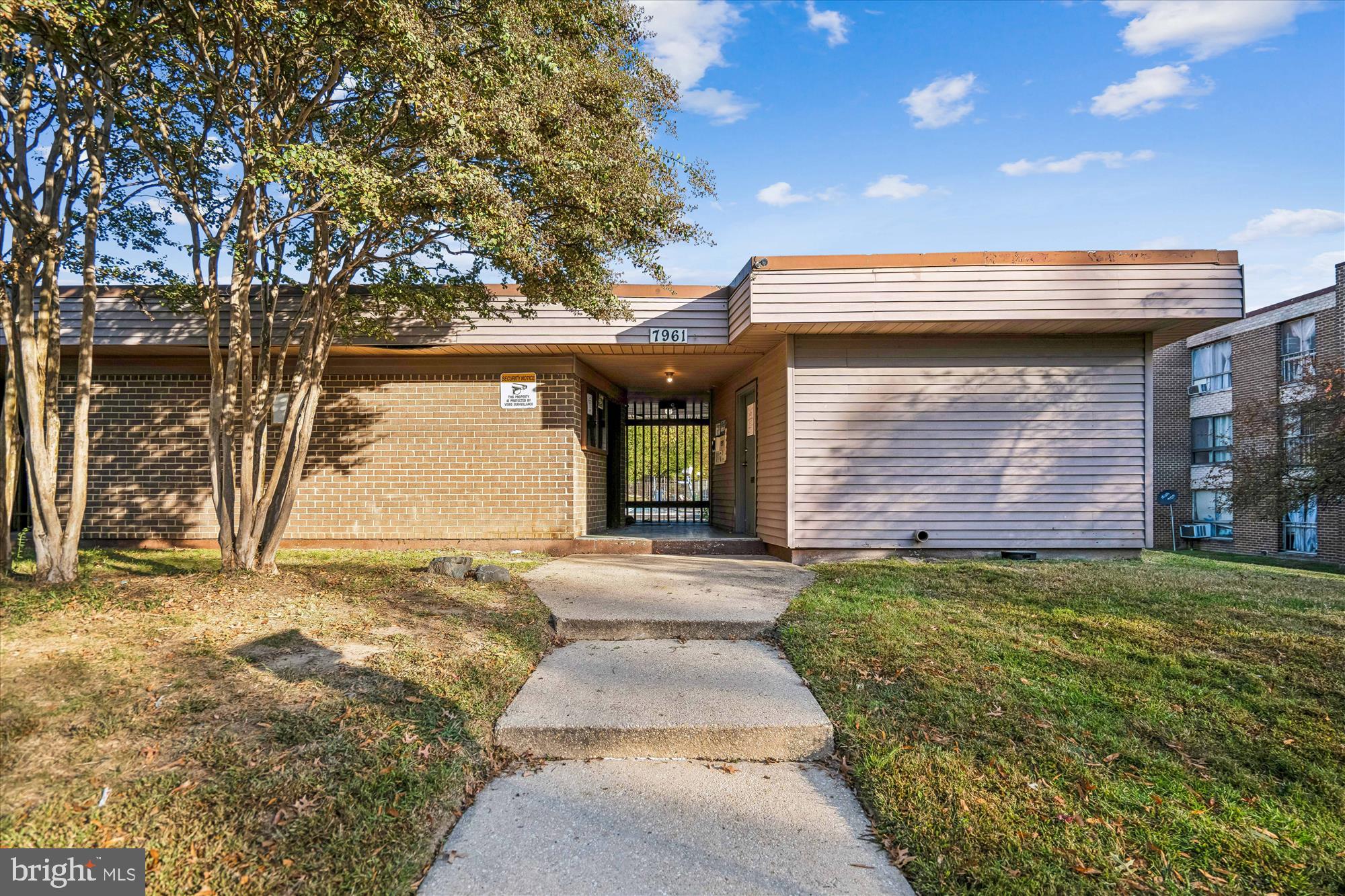7973 Riggs Road, Unit 8 Hyattsville, MD 20783 - Photo 8 of 45 a front view of a house with garden