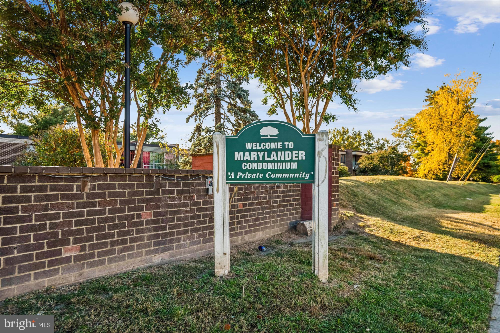 7973 Riggs Road, Unit 8 Hyattsville, MD 20783 - Photo 10 of 45 a sign on the side of a road