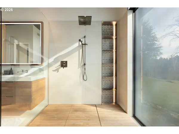 a view of a bathroom from the hallway