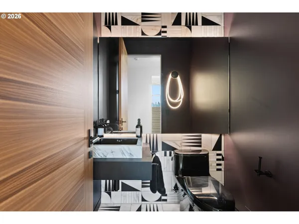 a view of a hallway with seating area