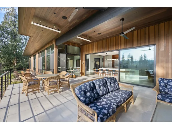 a view of a outdoor sitting area with furniture