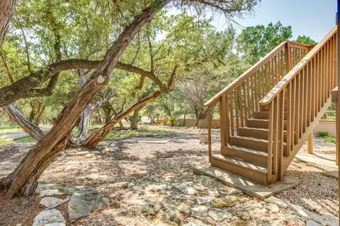 a view of stairs and wooden fence