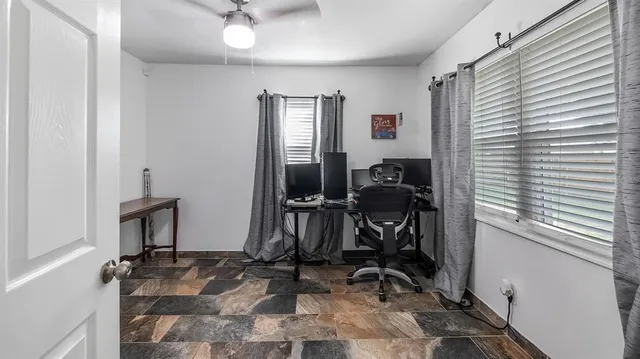 a view of workspace with gym equipment